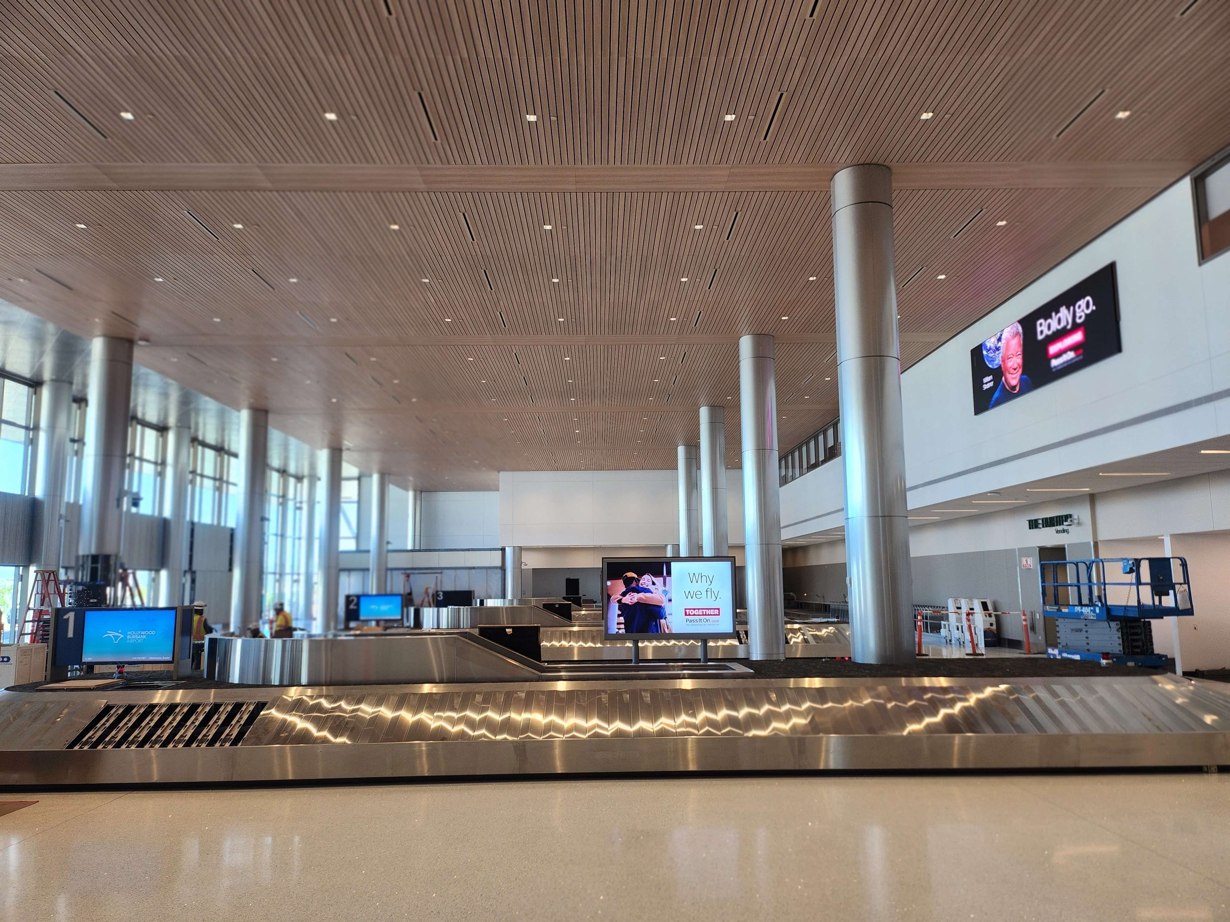 The new baggage claim area with three large luggage carousels